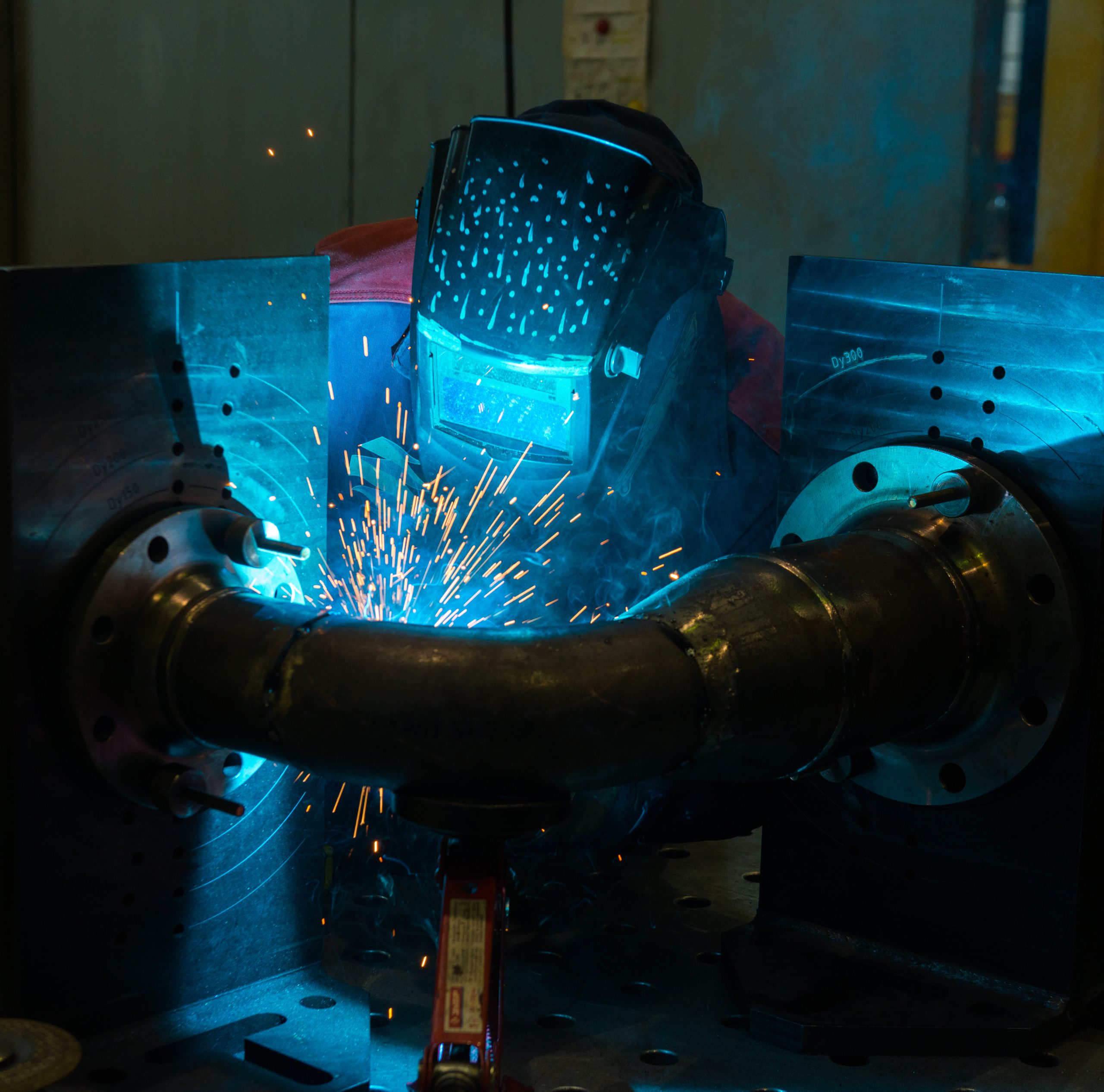 welder working with steel